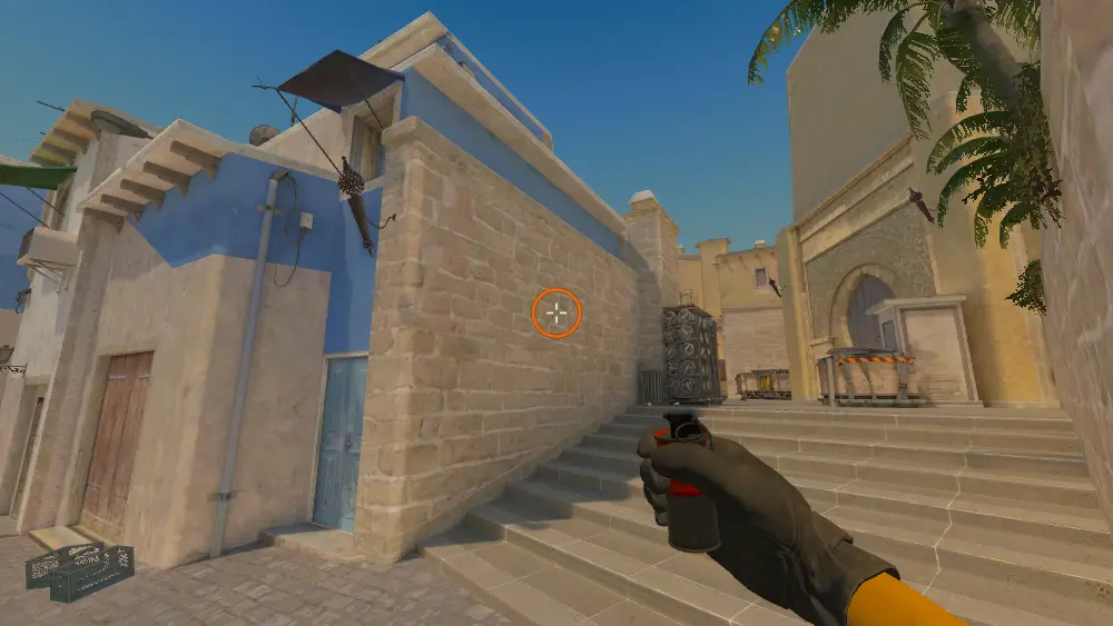 Standing on the CT spot on Mirage, the aim mark on the point this smoke is thrown at.