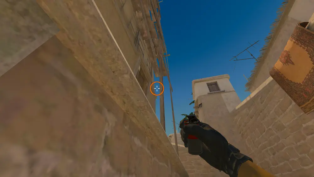 Standing on the A Ramp spot on Mirage, the aim mark on the point this smoke is thrown at.