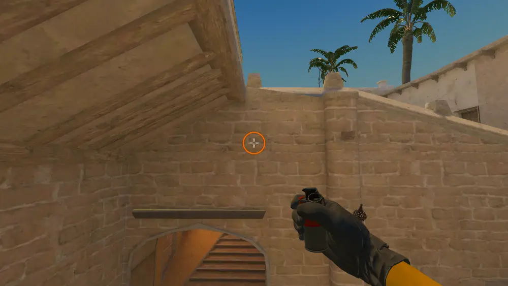 Standing on the T Roof spot on Mirage, the aim mark on the point this smoke is thrown at.
