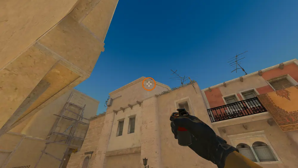 Standing on the T Spawn1 spot on Mirage, the aim mark on the point this smoke is thrown at.