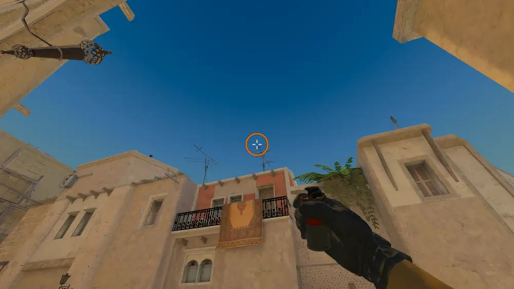 Standing on the Tspawn spot on Mirage, the aim mark on the point this smoke is thrown at.