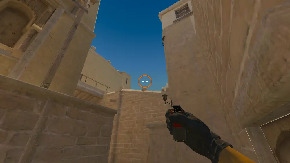Standing on the A Ramp spot on Mirage, the aim mark on the point this smoke is thrown at.