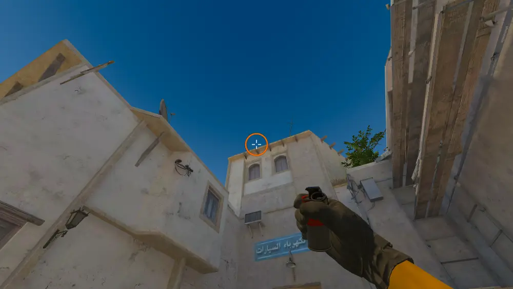 Standing on the CT Spawn spot on Mirage, the aim mark on the point this smoke is thrown at.