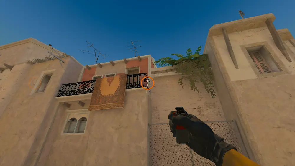 Standing on the T Spawn spot on Mirage, the aim mark on the point this smoke is thrown at.