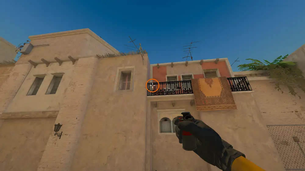 Standing on the T Spawn spot on Mirage, the aim mark on the point this smoke is thrown at.