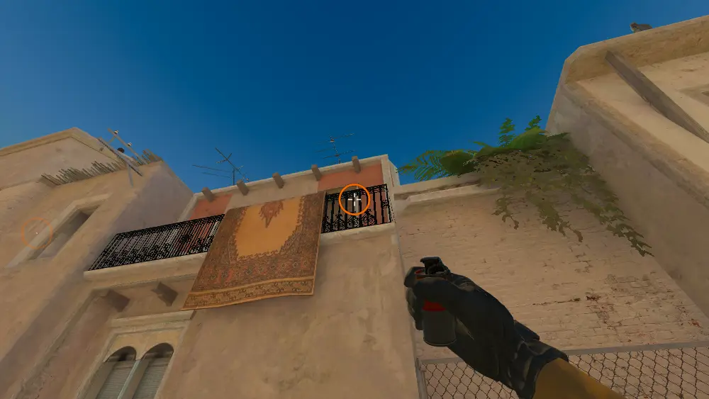 Standing on the T Spawn spot on Mirage, the aim mark on the point this smoke is thrown at.