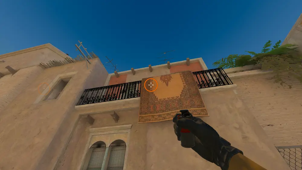Standing on the T Spawn spot on Mirage, the aim mark on the point this smoke is thrown at.