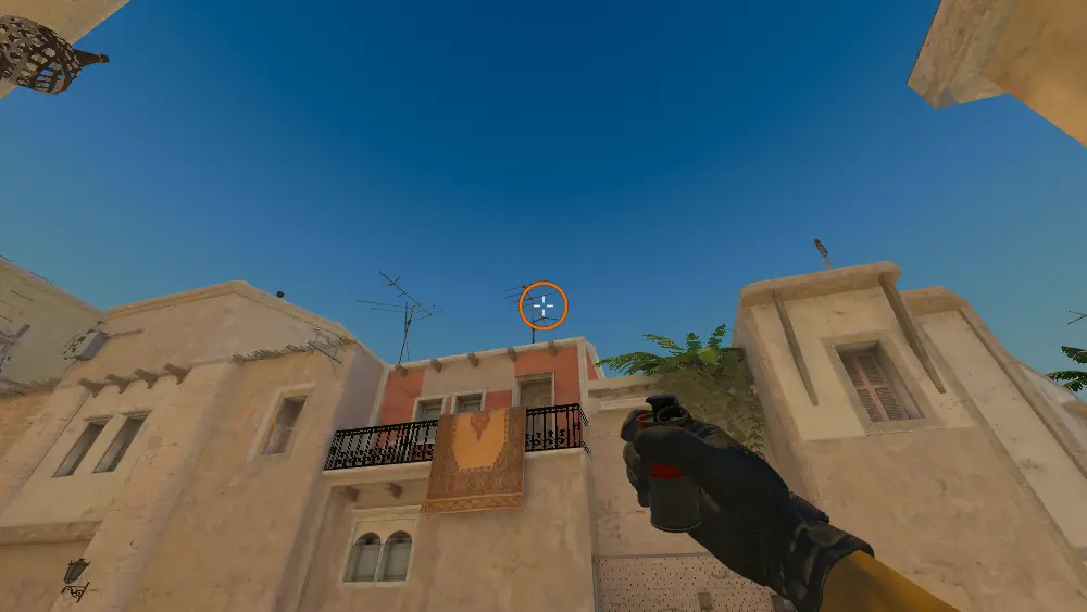 Standing on the T Spawn spot on Mirage, the aim mark on the point this smoke is thrown at.