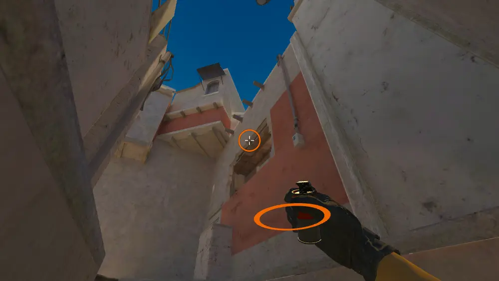 Standing on the Underpass spot on Mirage, the aim mark on the point this smoke is thrown at.