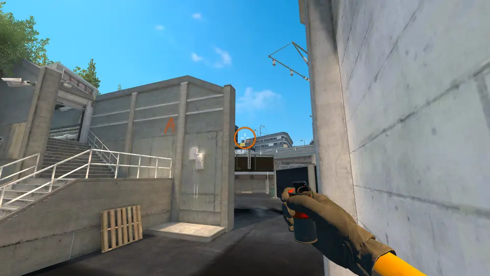 Standing on the T Spawn spot on Overpass, the aim mark on the point this smoke is thrown at.
