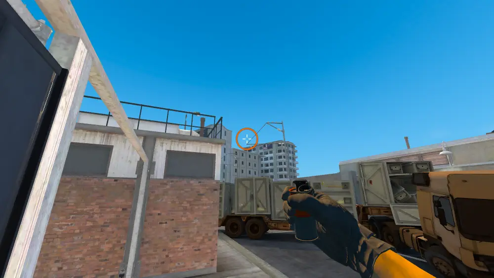 Standing on the CT Spawn Crouch spot on Overpass, the aim mark on the point this smoke is thrown at.