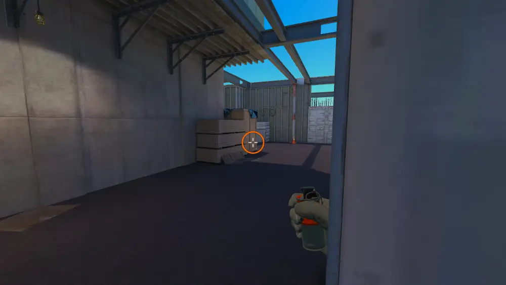 Standing on the CT spot on Vertigo, the aim mark on the point this smoke is thrown at.